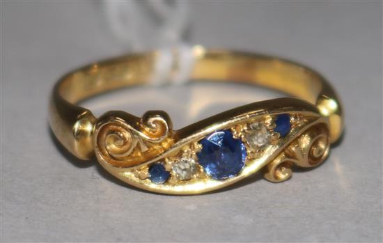 A late Victorian 18ct gold, sapphire and diamond ring, size M.